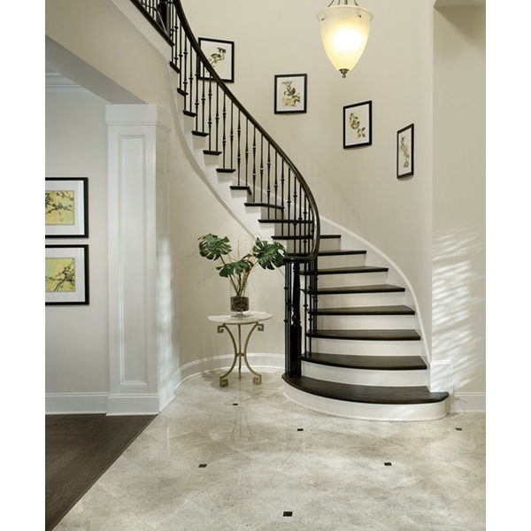 curved staircase with hammered spoon metal balusters